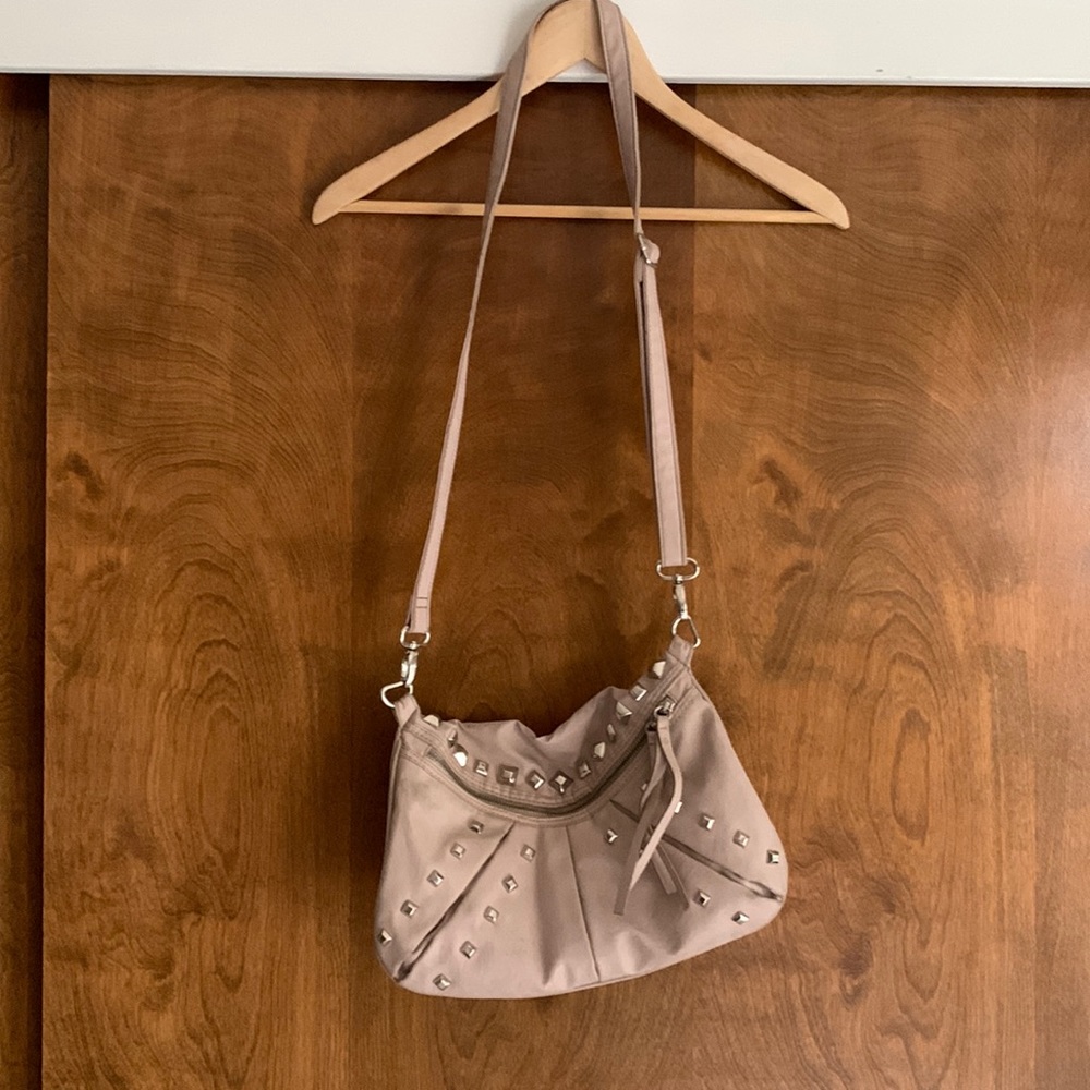 Salmon colored studded satchel purse